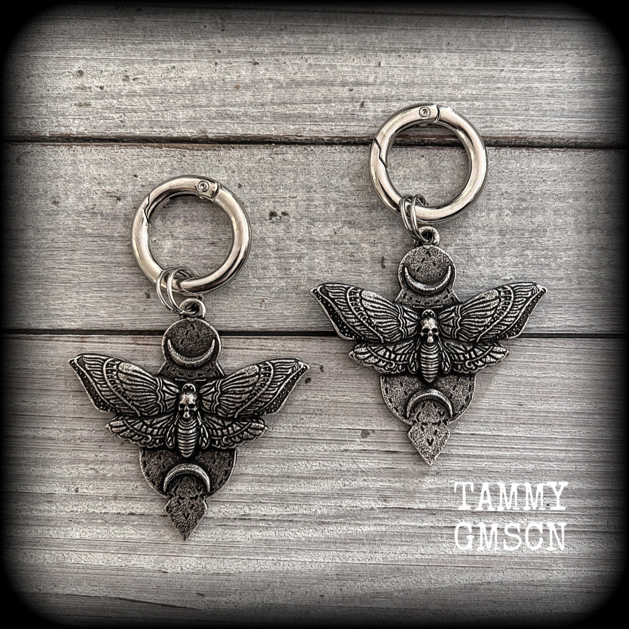 These stunning boot charms are one of the larger and heavier pairs we offer, featuring gorgeous pewter moth and crescent moon charms, nice and big-these measure approx 5 across and just on 8cms from top to bottom.

Made to last, all our boot charms are made with super sturdy snap rings and strong jump rings.