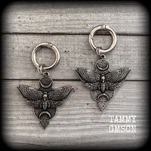 These stunning boot charms are one of the larger and heavier pairs we offer, featuring gorgeous pewter moth and crescent moon charms, nice and big-these measure approx 5 across and just on 8cms from top to bottom.

Made to last, all our boot charms are made with super sturdy snap rings and strong jump rings.