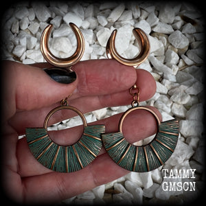 Inspired by Ishtar, Mesopotamian Goddess of love, beauty, sex and war, these beautiful patina and rose gold battle shield gauged earrings weigh approx 8 grams a piece, and measure just under 7 cms from tip to tip.

This pair have been made on 5/8” gauge (16mm) surgical steel cradles, suitable for stretched lobes.