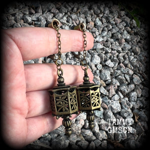 These gorgeous earrings feature an antique bronze Japanese lantern, are nice and big, measuring just on 8.5cms from tip to tip, and weigh approx 15 grams each.

💥This listing includes one pair of surgical steel single flared O-ring earlets

