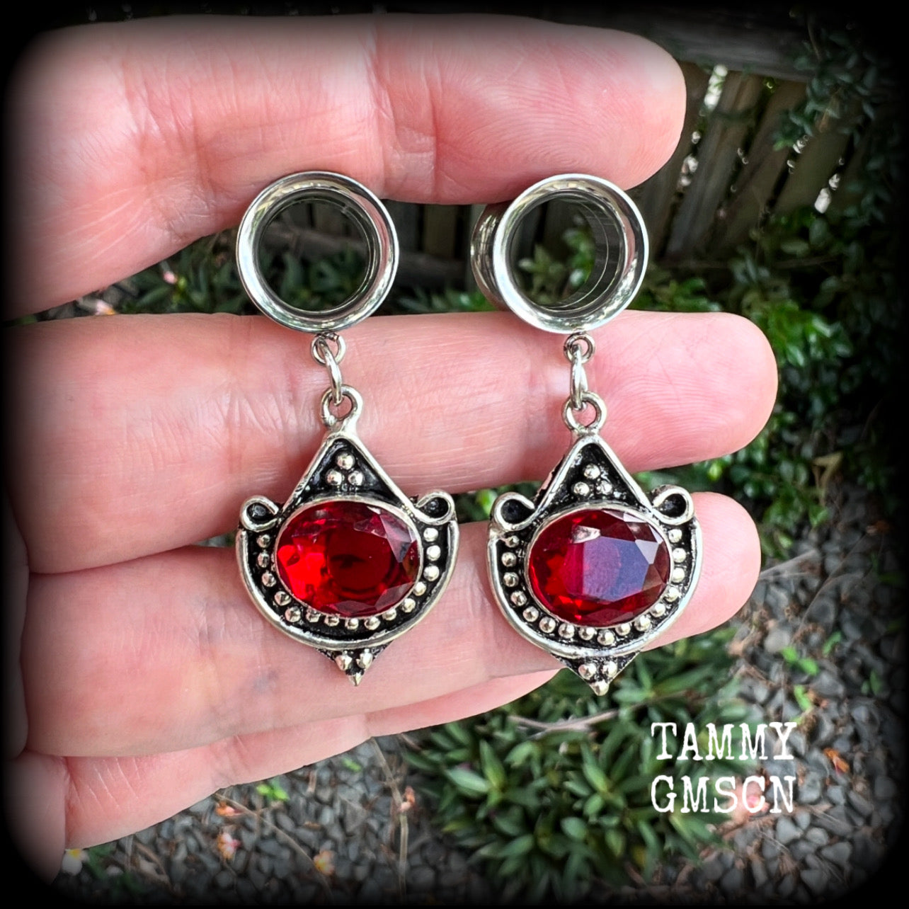These beautiful earrings have been made with gorgeous deep red garnet gemstones in a beautiful boho antique silver setting, are nice and light weight, weighing approx 6 grams each and measuring 4.5 from tip to tip.

These gorgeous tunnel dangles have been made with 1/2" (12mm) gauge surgical steel screw fit earlets.