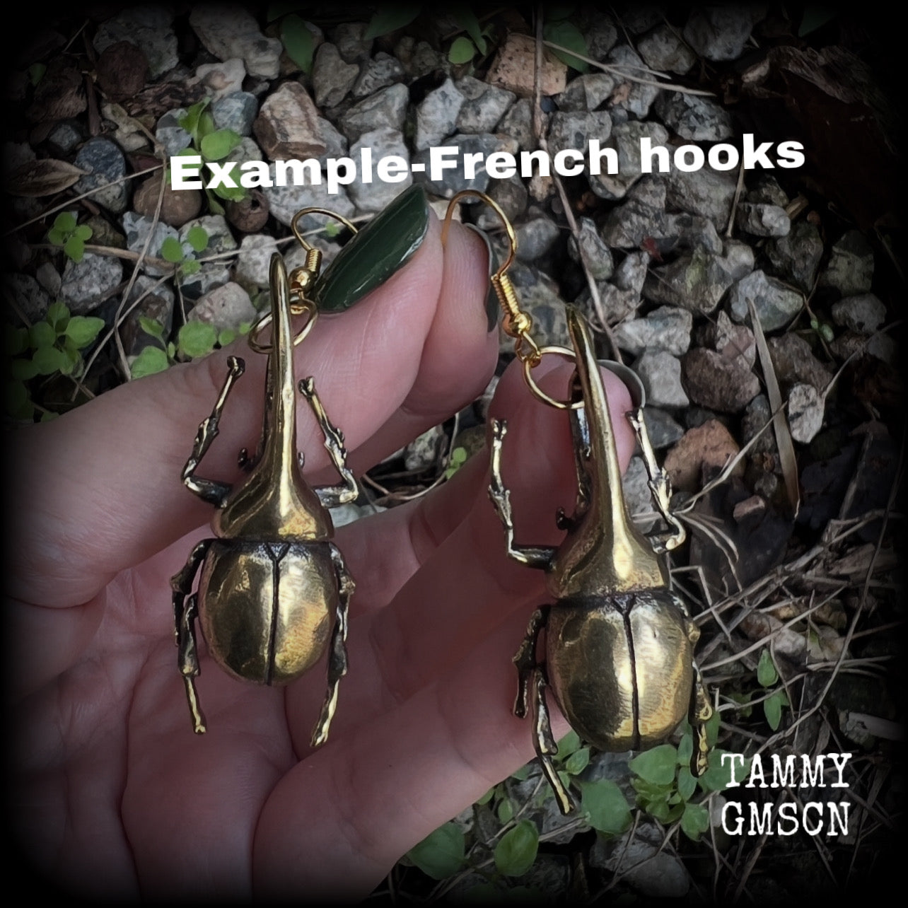 These gorgeous brass Hercules beetle earrings are big and beautiful! Weighing approx 19 grams each, this pair measures 7cms from tip to tip.

This pair has been made on antique gold french hooks, suitable for pierced ears.