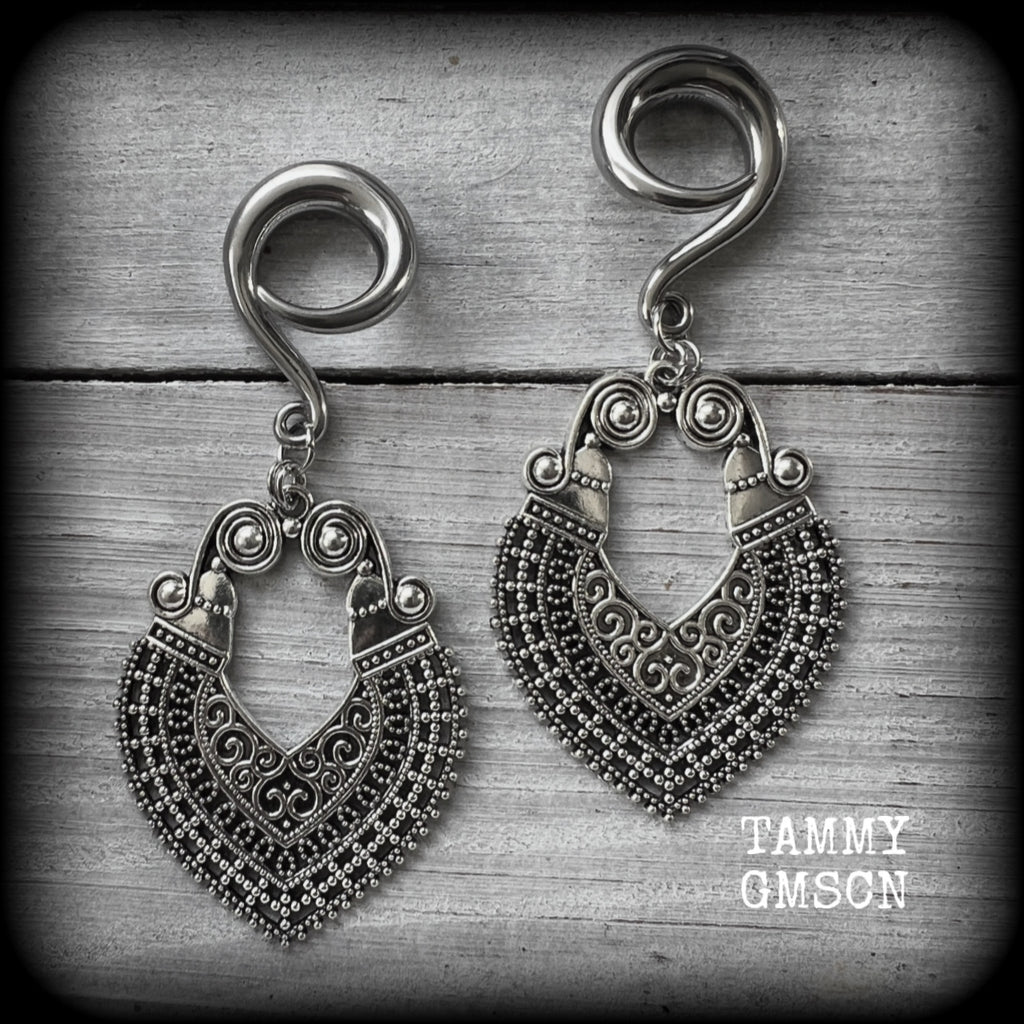These beautiful ornate gauged earrings are inspired by Aphrodite, the Greek Goddess of love and beauty, weighing approx 14 grams a piece and measuring just over 8cms from tip to tip.

This pair have been made with 2 gauge (6mm) surgical steel full curl hooks, to be worn in stretched lobes.