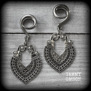 These beautiful ornate gauged earrings are inspired by Aphrodite, the Greek Goddess of love and beauty, weighing approx 14 grams a piece and measuring just over 8cms from tip to tip.

This pair have been made with 2 gauge (6mm) surgical steel full curl hooks, to be worn in stretched lobes.