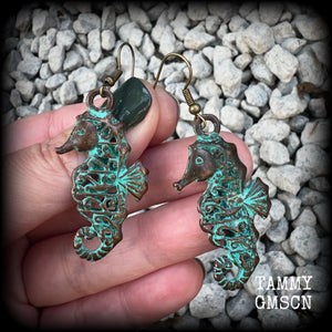 This pair of earrings features a gorgeous antique verdigris patina seahorse, measuring just under 6cms from tip to tip, and weighing 7 grams each.

This pair has been made with french hooks, for pierced ears.