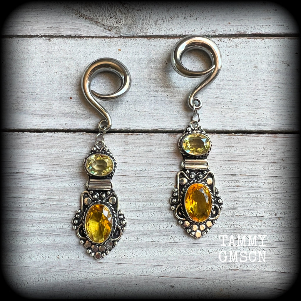 🔥 Citrine attracts good luck, clarity and confidence 🔥

Featuring gorgeous golden yellow cutrine gemstone in a beautiful boho antique silver setting, these earrings measure just on 8cms from tip to tip, and weigh approx 14 grams each.

This pair have been made on 6 gauge (4mm) surgical steel full curl hooks, suitable for stretched lobes.