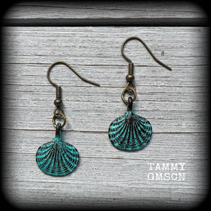 This is a simpler pair of earrings from our Sea Hag range, featuring a single gorgeous verdigris patina charm shell, measuring just under 4cms from tip to tip and weighing only a few grams each.

This pair has been made with antique bronze french hooks, for pierced ears.