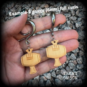 🔥 The lucky mallet is part of Japanese folklore. Uchide no kozuchi is a legendary Japanese "magic hammer" which can "tap out" anything wished for. This treasure is also known as "magic wishing mallet", "lucky hammer", and "the mallet of fortune" 🔥

These earrings feature a hand carved peach wood lucky mallet, measuring just on 6.5 cms from tip to tip and weighing approx 10 grams each.

This pair have been made with 2 gauge (6mm) surgical steel full curl hooks, to be worn in stretched lobes.