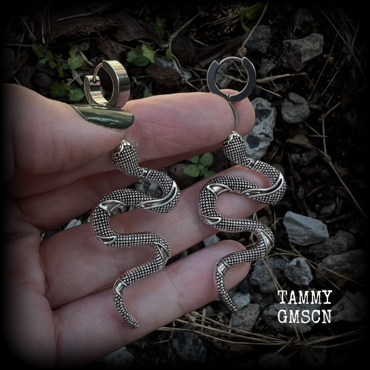 These awesome earrings feature an antique silver snake, are nice and lightweight at 7 grams each, and measure in at approx 7cms from tip to tip.

This pair have been made on stainless steel huggie ear cuffs, suitable for pierced ears.