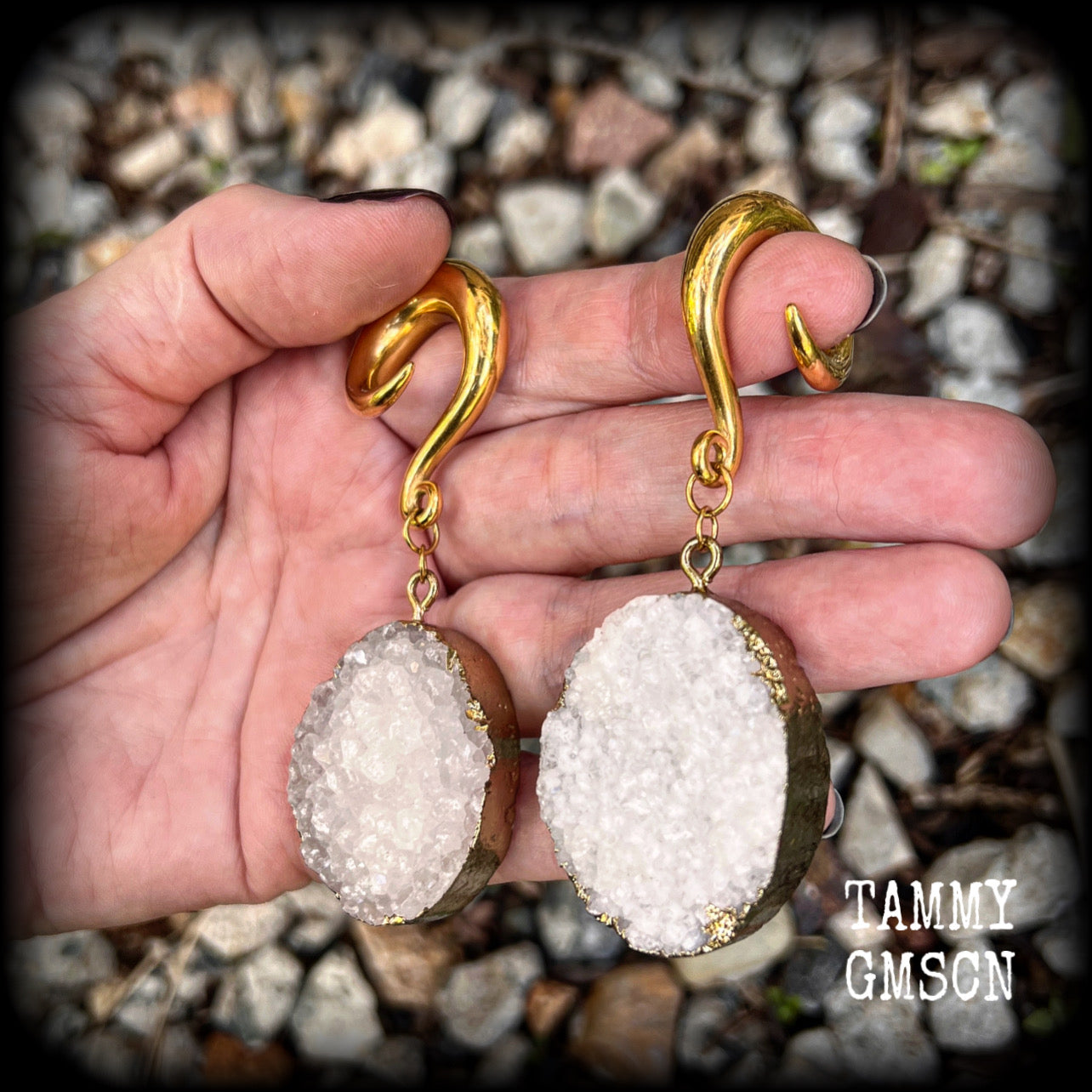 These big beautiful gauged earrings feature snow white and antique gold druzy pieces, measuring just on 8cms from tip to tip, and weighing approx 35 grams a piece.

This pair have been made on 0 gauge (8mm) surgical steel full curl hooks, suitable for stretched lobes.