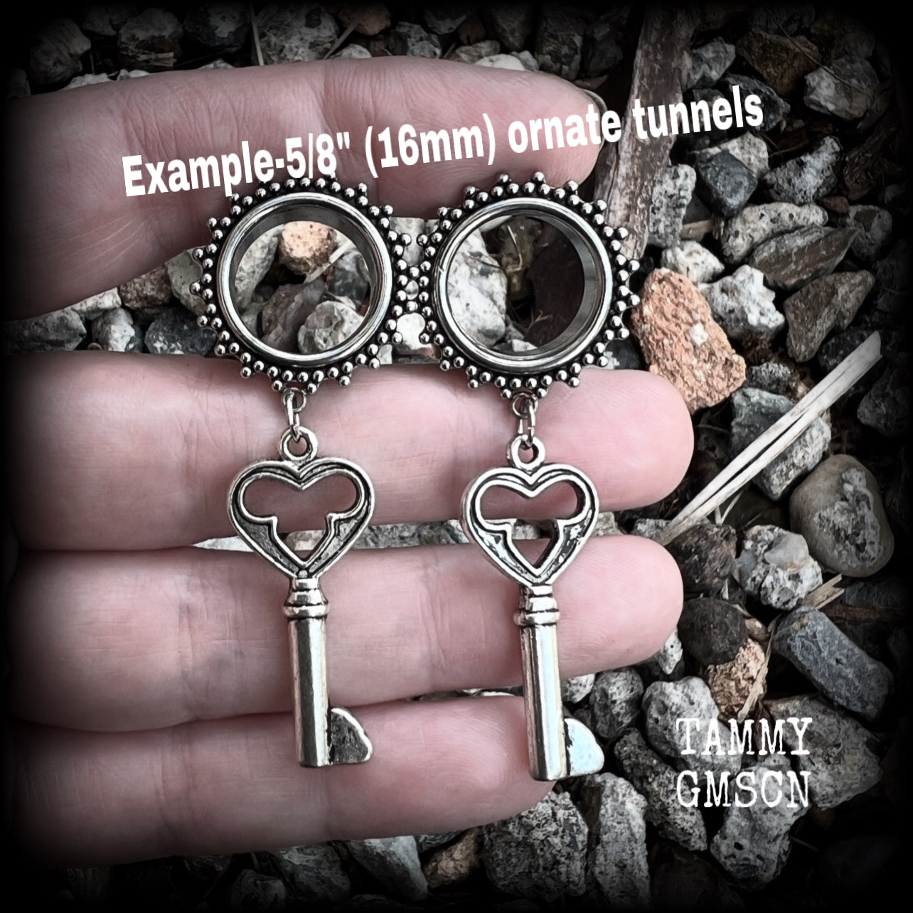 These gothic cathedral inspired tunnel earrings feature gorgeous antique silver keys, weighing approx 9 grams each, and measuring just under 6cms from tip to tip.

This pair have been made on 5/8” gauge (16mm) ornate surgical steel tunnels, suitable for stretched lobes.