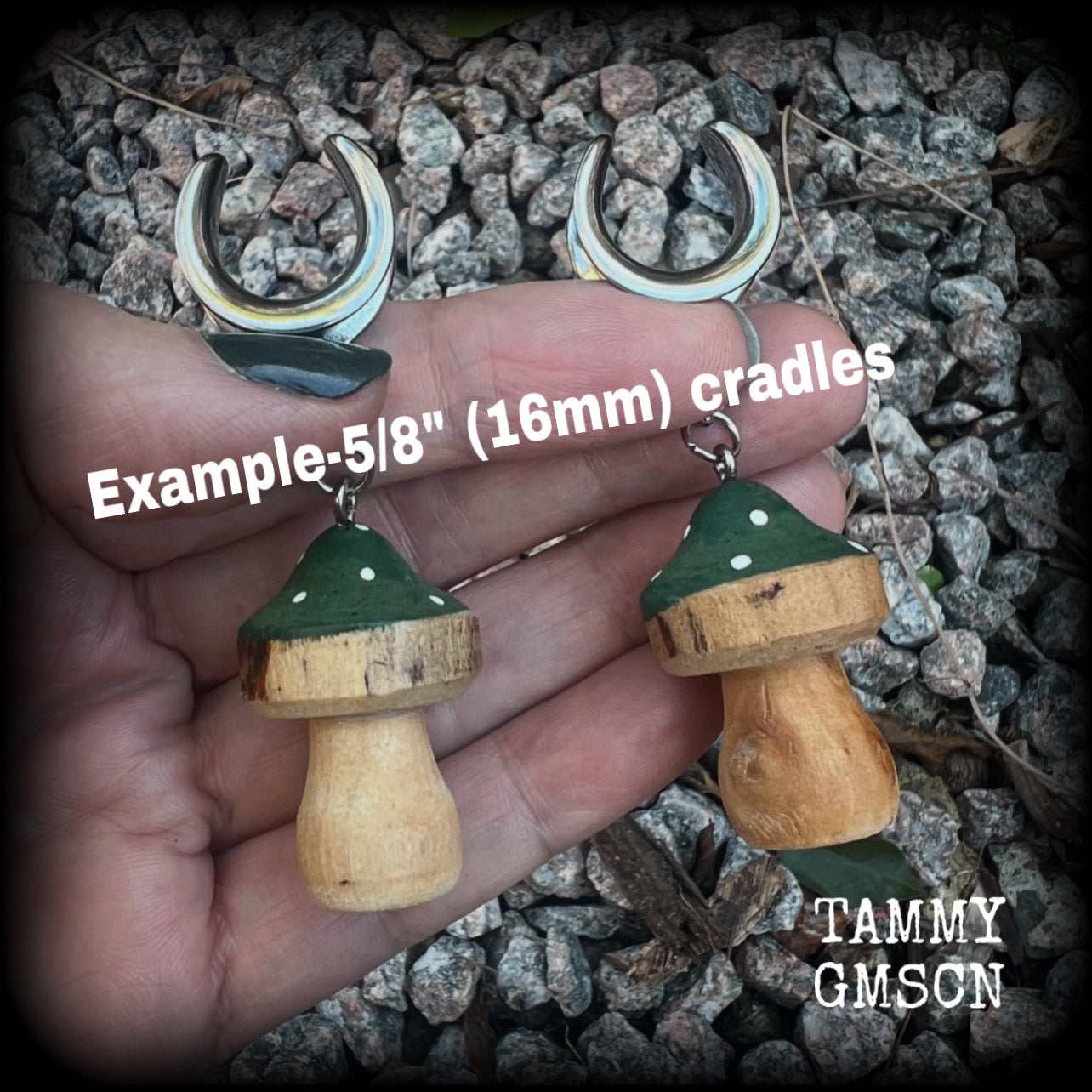 This pair of earrings features gorgeous forest green wood mushrooms, nice and light weight at 8 grams a piece, and nice and dangly at just on 7cms.

This pair has been made on 5/8” gauge (16mm) surgical steel cradles, suitable for stretched lobes.

