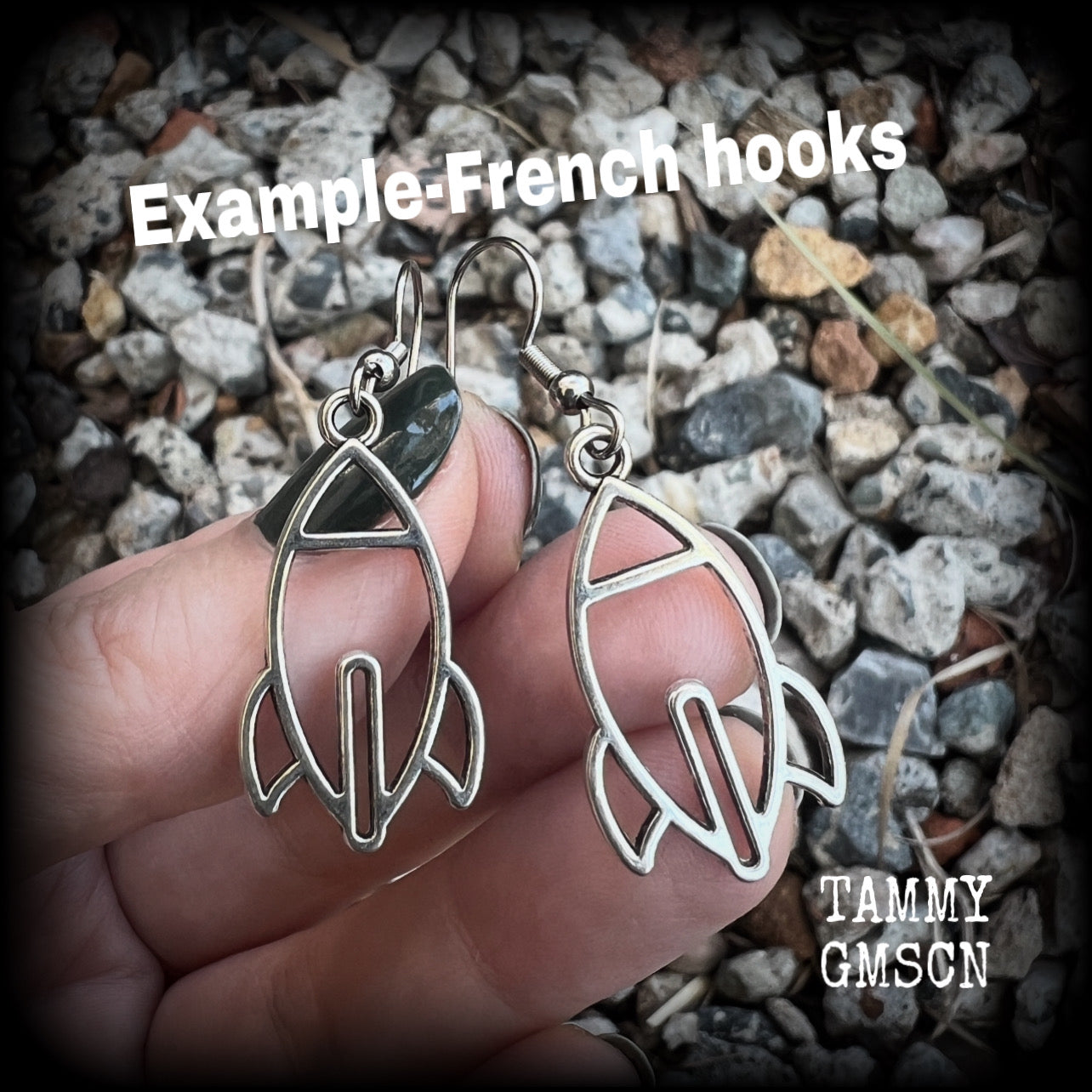This pair of super cute antique silver space rocket earrings measures just 4cms from tip to tip, and weigh only a few grams each (nice and light weight).

This pair has been made on stainless steel french hooks, suitable for pierced ears.

