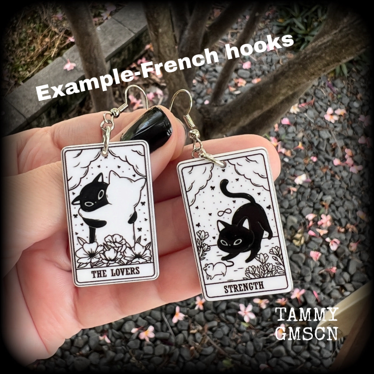 These adorable cat tarot earrings feature The Lovers and Strength lightweight tarot card charms, weighing only a few grams each, and measure approx 5cms from tip to tip.

This pair has been made with stainless steel french hooks, for pierced ears.
