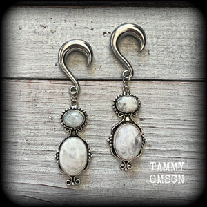 These gauged earrings have been made with gorgeous big polished Rainbow moonstone gemstones in a beautiful boho antique silver setting, measuring approx 8cms from tip to tip, and weighing approx 12 grams each, not too heavy.

These earrings have been made on 2 gauge (6mm) surgical steel half curl hooks, to be worn in stretched lobes.

