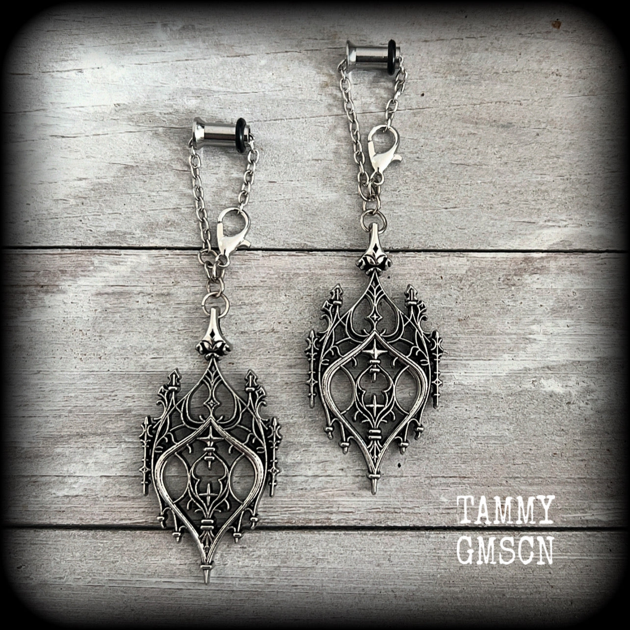 These gorgeous gothic earrings feature a beautiful antique silver ornate gothic cathedral architectural arch, measuring just on 8.5cms from tip to tip, and weighing approx 7 grams each.

 💥This listing includes one pair of surgical steel single flared O-ring earlets