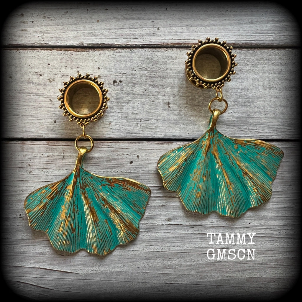 These beautiful boho tunnel earrings feature gorgeous patina ginkgo leaves, weighing approx 16 grams each and measuring  just under 7.5cms from tip to tip.

This pair has been made with 9/16” gauge (14mm) ornate surgical steel screw fit tunnels.