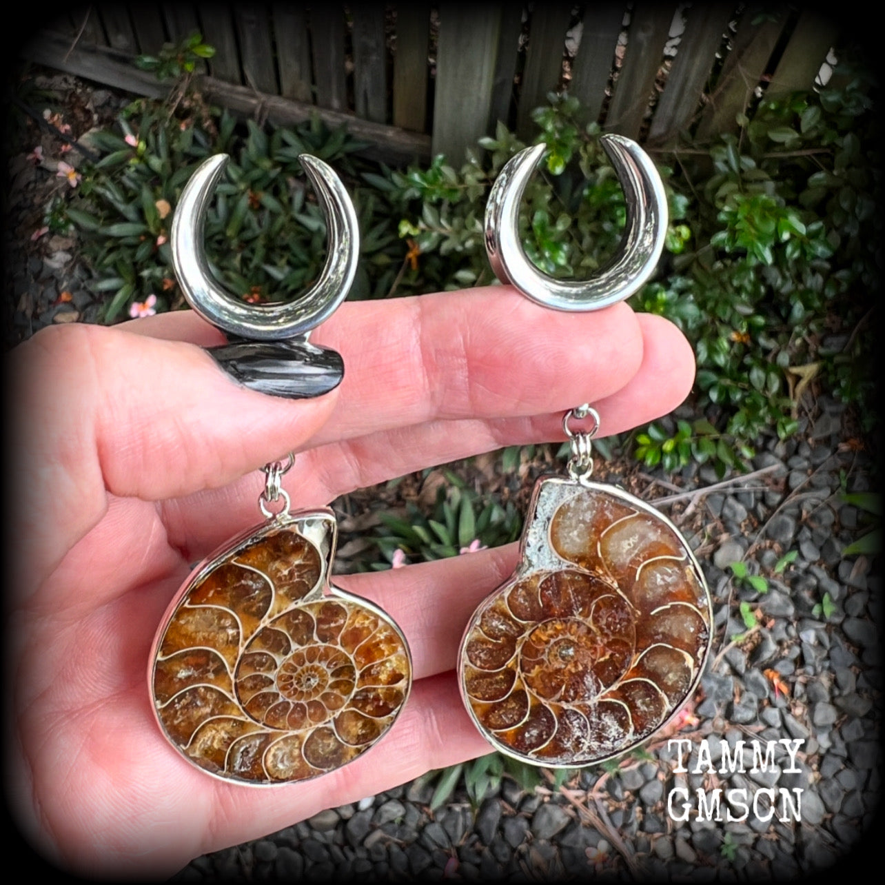These big beautiful ammonite fossil gauged earrings are gorgeous!! This pair measures just on 9cms from tip to tip, and weigh in at approx 25 grams each.

♥️ IF YOU ORDER THESE EARRINGS YOU RECEIVE THIS EXACT PAIR ♥️

This pair has been made on 3/4" gauge (19mm) surgical steel cradles, suitable for stretched lobes.