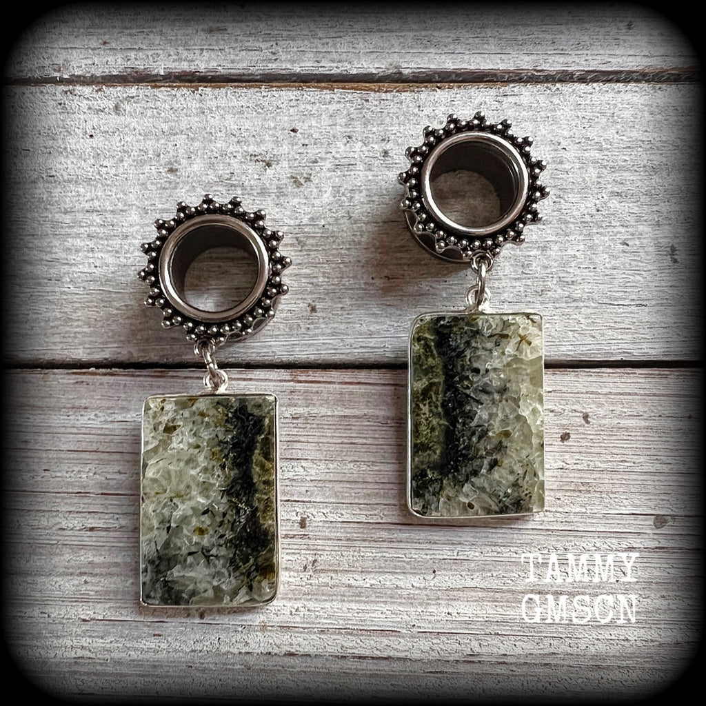 These unique tunnel earrings have been made with beautiful moss agate gemstones, are light weight at approx 10 grams each, and measuring just over 5cms from tip to tip.

This pair have been made on 1/2” gauge (12mm) gauge ornate surgical steel screw fit tunnels.