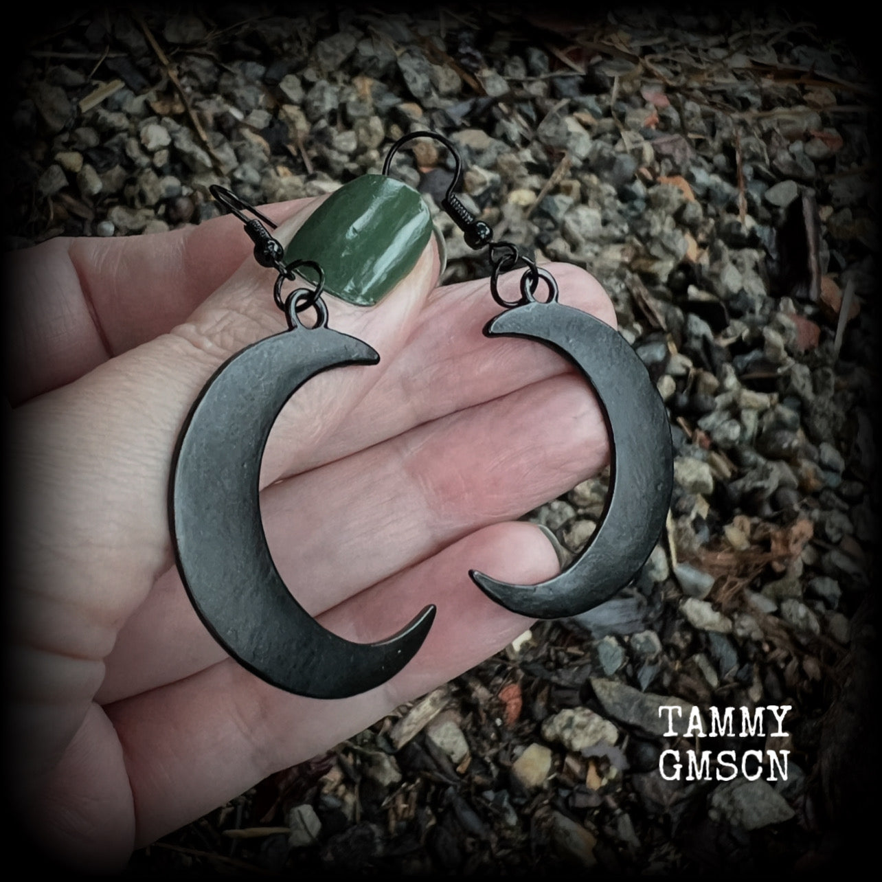 Featuring large black enamel crescent moons, these stunning crescent moon earrings measure just under 7cms from tip to tip and are nice and light weight at approx 5 grams each.

This pair has been made with french hooks, for pierced ears.
