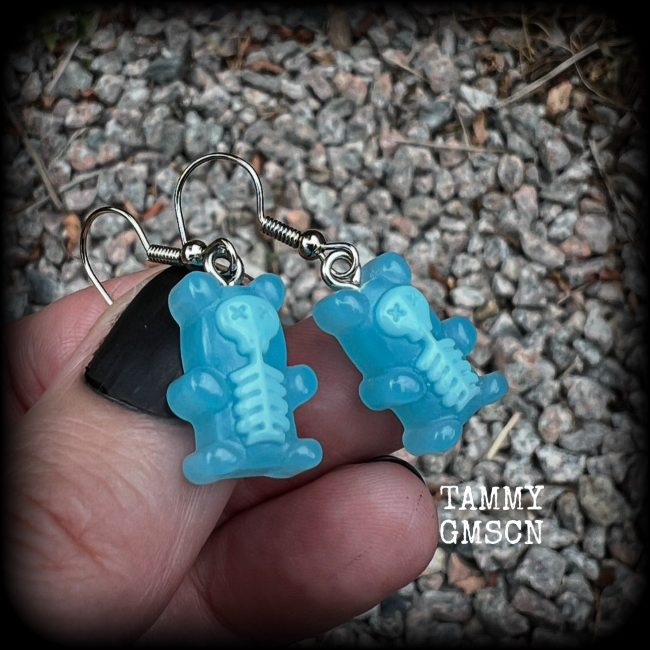 Featuring spooky cute blue skeleton gummy bears, these adorable earrings measure just on 5cms from tip to tip and are super light weight, weighing only a gram or two each.

This pair has been made with stainless steel french hooks, to be worn in pierced ears.