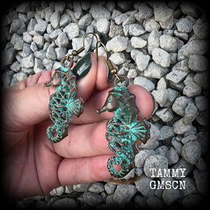 This pair of earrings features a gorgeous antique verdigris patina seahorse, measuring just under 6cms from tip to tip, and weighing 7 grams each.

This pair has been made with french hooks, for pierced ears.