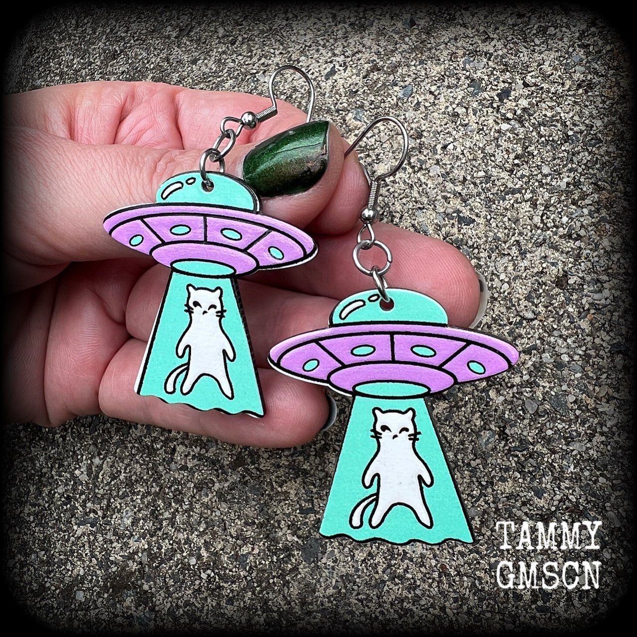 These adorable pastel purple 'UFO cat abduction' earrings measure just over 6cms from tip to tip, and weigh only a few grams each.
This pair has been made on stainless steel french hooks, suitable for pierced ears.