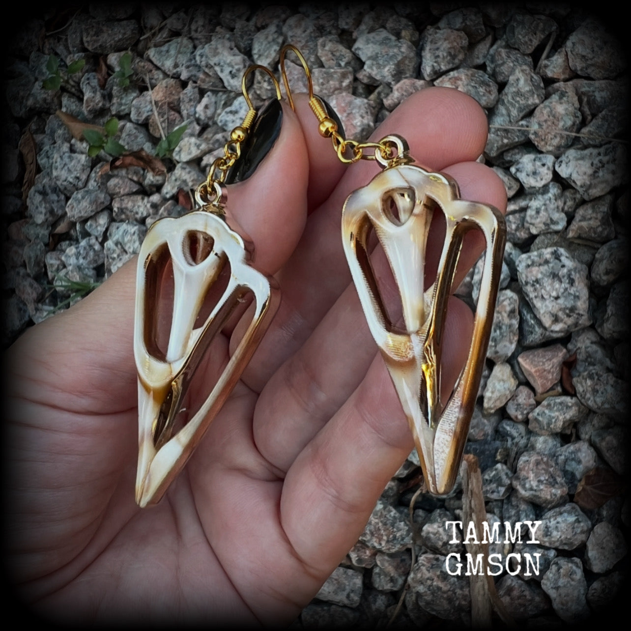 These earrings feature gorgeous acrylic conch sea shell slices , super lightweight- weighing only a few grams each, and nice and dangly, measuring just on 7cms from tip to tip. 

These beautiful earrings have been made with antique gold french hooks-for pierced ears.