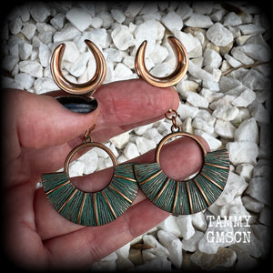 Inspired by Ishtar, Mesopotamian Goddess of love, beauty, sex and war, these beautiful patina and rose gold battle shield gauged earrings weigh approx 8 grams a piece, and measure just under 7 cms from tip to tip.

This pair have been made on 5/8” gauge (16mm) surgical steel cradles, suitable for stretched lobes.