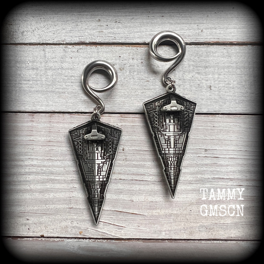 These awesome Star Wars Imperial Star Destroyer gauged earrings are nice and big, measuring just under 10cms from tip to tip, and not too heavy at 28 grams a piece.


This pair has been made on 2 gauge (6mm) surgical steel full curl hooks, to be worn in stretched lobes.