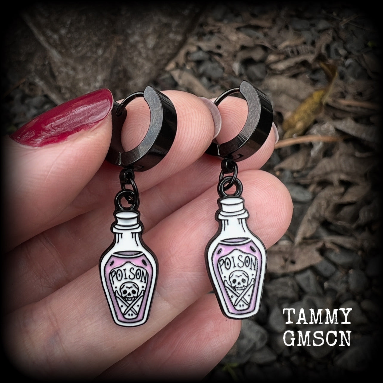 Poison bottle huggie earrings-Pastel goth earrings