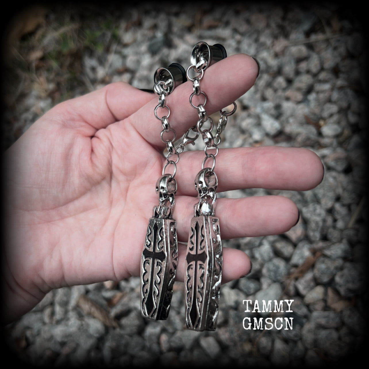 These beautiful antique silver and black enamel coffin tunnel dangles are nice and dangly, weighing approx 25 grams each, and measuring just over 11cms from tip to tip.

⚰️ This listing is for a chunky chain/lobster clasp combination suitable for 00 gauge and larger. 
If you choose a smaller size of tunnel than 00 gauge we will make these on a smaller chain.