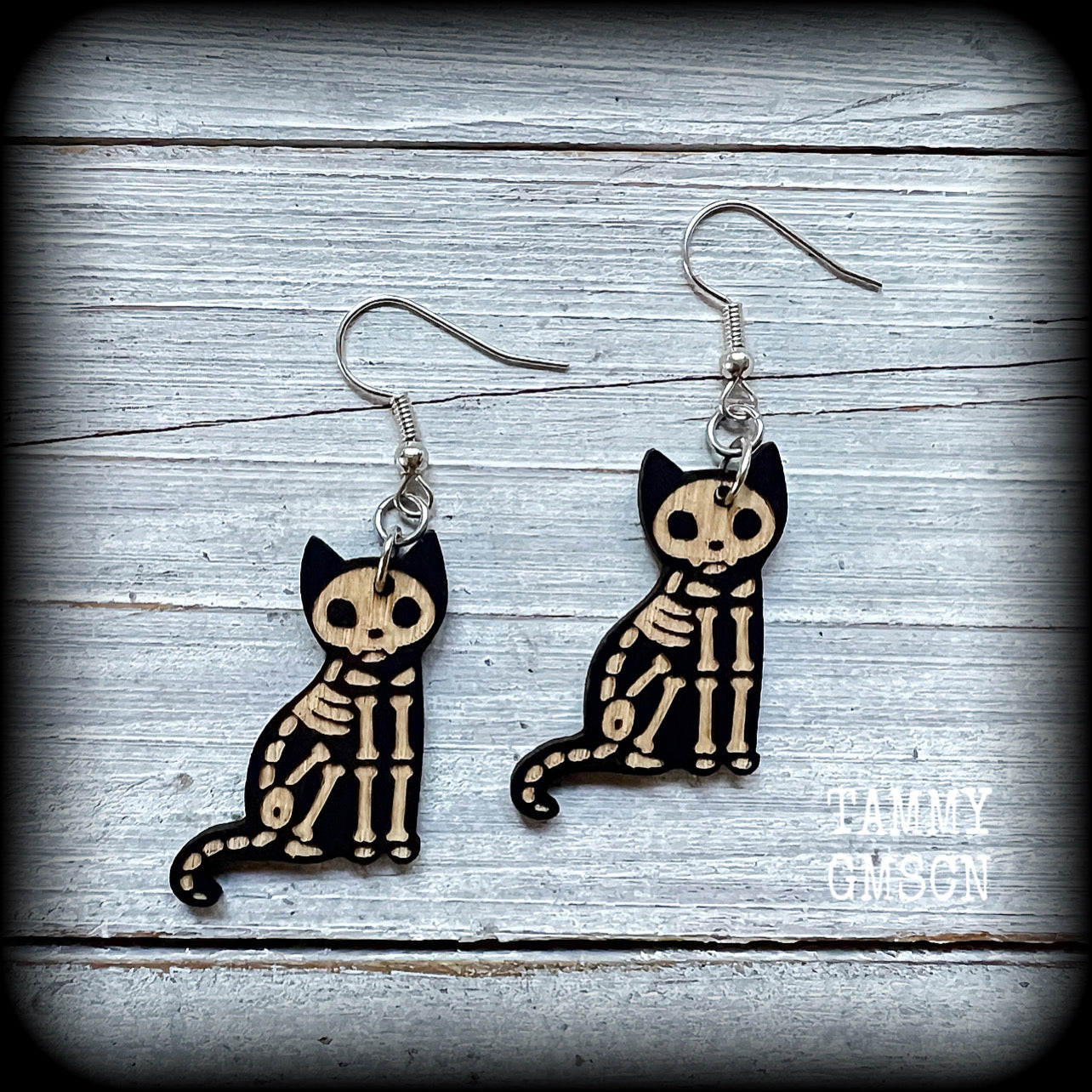 Skeleton cat earrings 