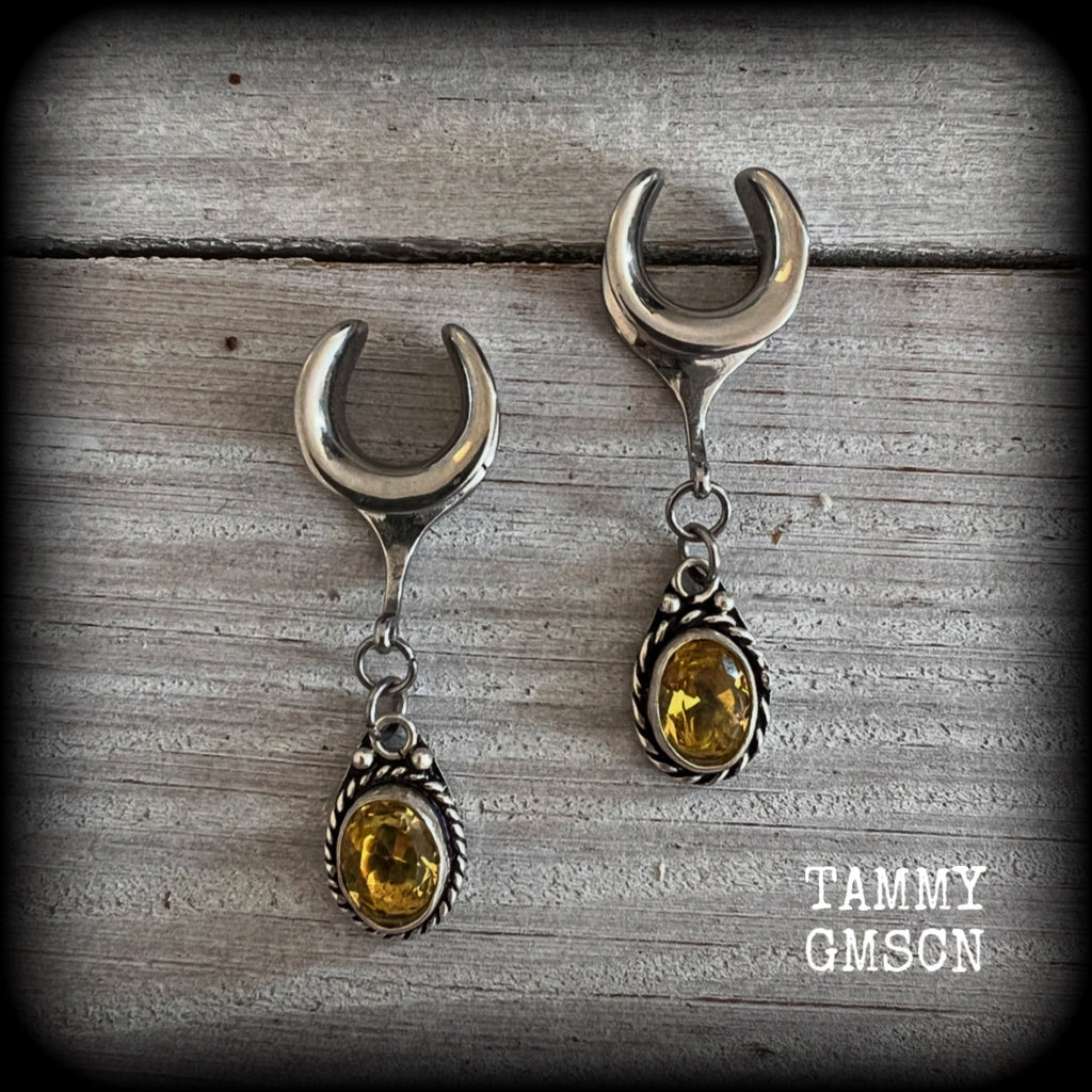 These beautiful boho gauged earrings have been made with gorgeous yellow citrine gemstones, lovely and dangly at approx 4.5cms from tip to tip, and weighing approx 5 grams each.  These earrings have been made on 1/2” gauge (12mm) surgical steel cradles, to be worn in stretched lobes.