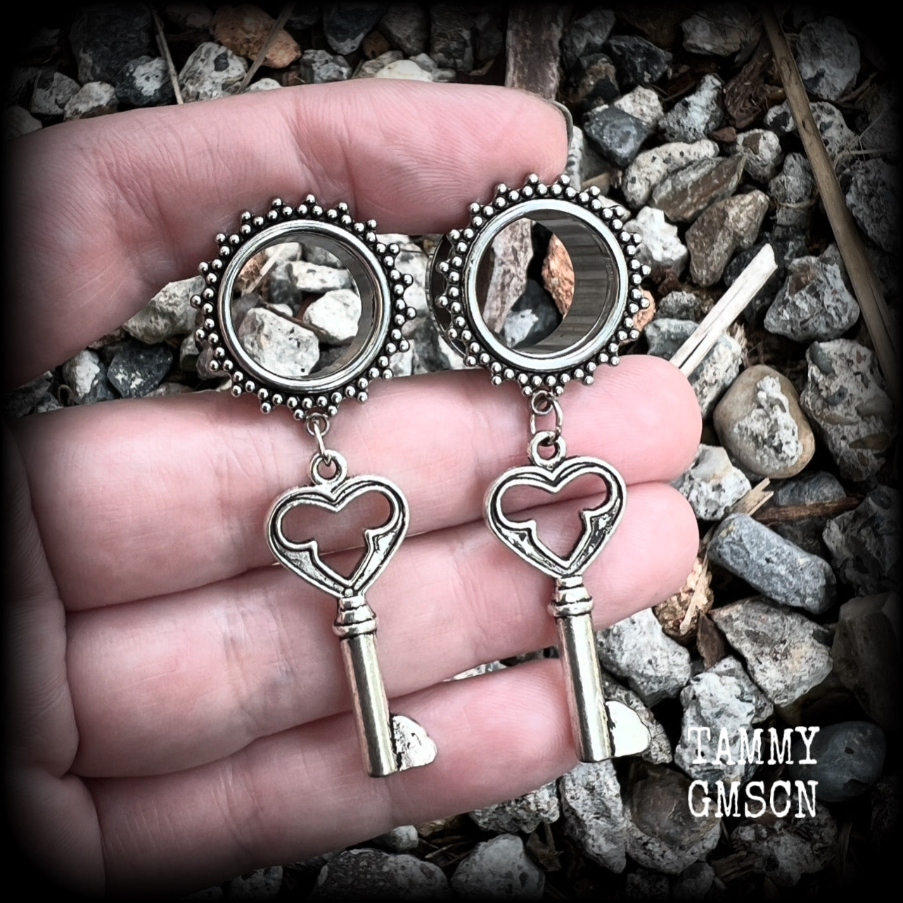 These gothic cathedral inspired tunnel earrings feature gorgeous antique silver keys, weighing approx 9 grams each, and measuring just under 6cms from tip to tip.

This pair have been made on 5/8” gauge (16mm) ornate surgical steel tunnels, suitable for stretched lobes.