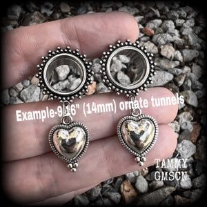 These gorgeous tunnel earrings feature beautiful antique silver hearts, are nice and lightweight, weighing only 7 grams each and measure approx 4.5cms from tip to tip.
This pair has been made with 9/16" (14mm) gauge ornate surgical steel screw fit tunnels.