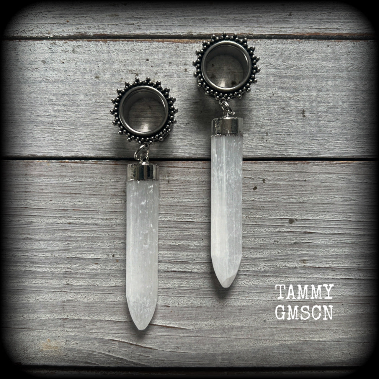 These unique earrings have been made with beautiful rustic Selenite points, weighing approx 15grams each and measuring approx 8.5cms from tip to tip.

This pair has been made with 9/16" (14mm) gauge ornate surgical steel screw fit tunnels.