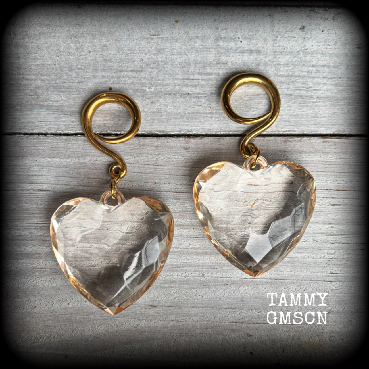 These beautiful gauged earrings feature faceted faux glass love hearts, measuring just under 7cms from tip to tip, and weighing approx 13 grams a piece.

This pair have been made on 6 gauge (4mm) surgical steel full curl hooks, suitable for stretched lobes.