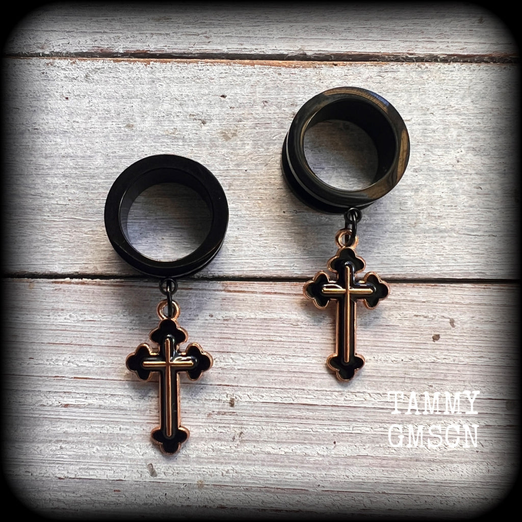 These gorgeous gothic Christian cross tunnel earrings feature beautiful champagne gold and black enamel crosses, weighing in at just 6 grams each, and measuring just on 5 cms from tip to tip.

This pair of tunnel dangles have been made with 3/4" gauge (19mm) screw fit surgical steel tunnels-suitable for stretched lobes.