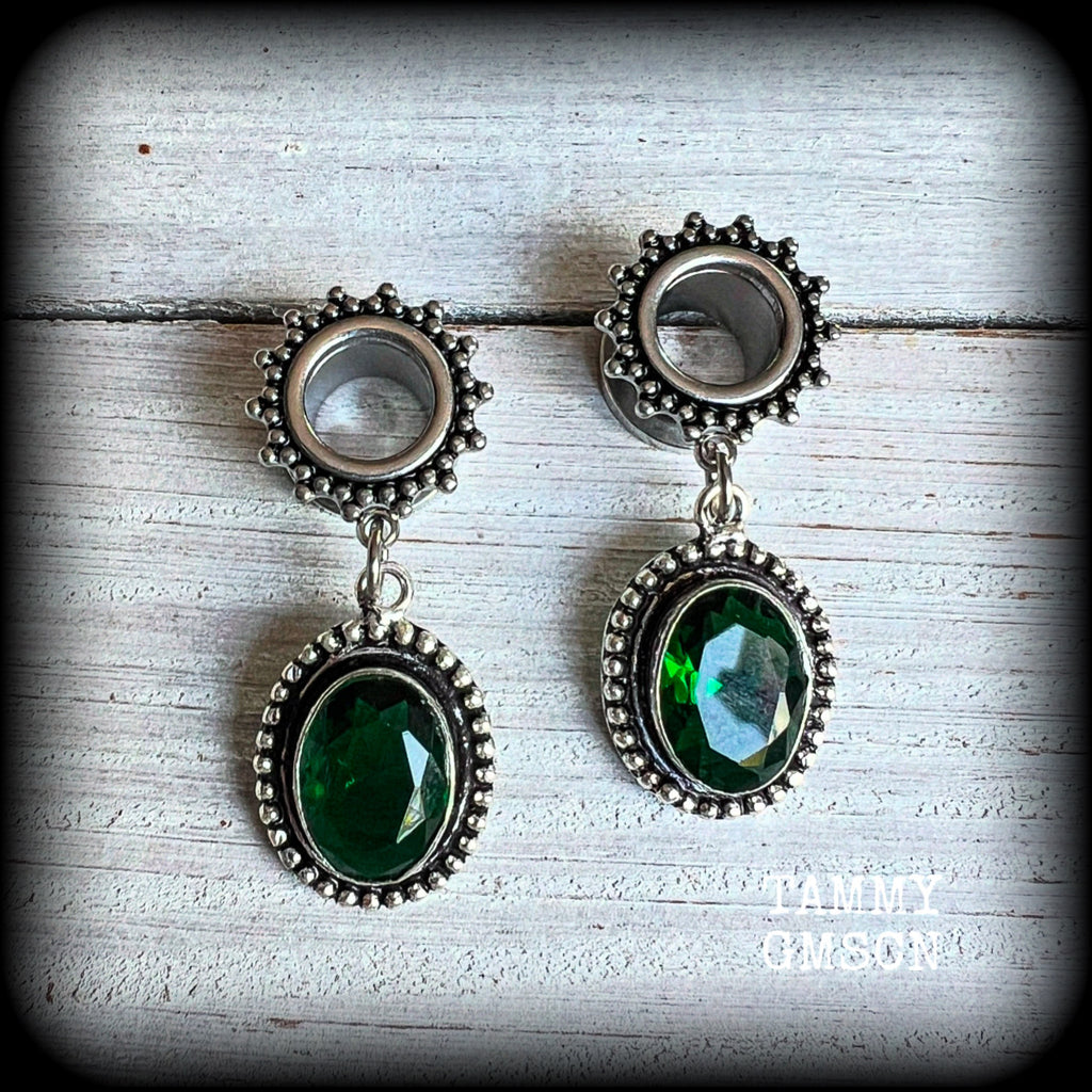 💚 Green quartz is associated with the heart chakra and is thought to awaken love, empathy, compassion.

These gorgeous earrings have been made with beautiful deep green faceted quartz gemstones in antique silver settings, beautifully light weight, weighing approx 7 grams each and measure 4.5 cms from tip to tip.

This pair has been made with 00 gauge (10mm) surgical steel screw fit ornate tunnels.