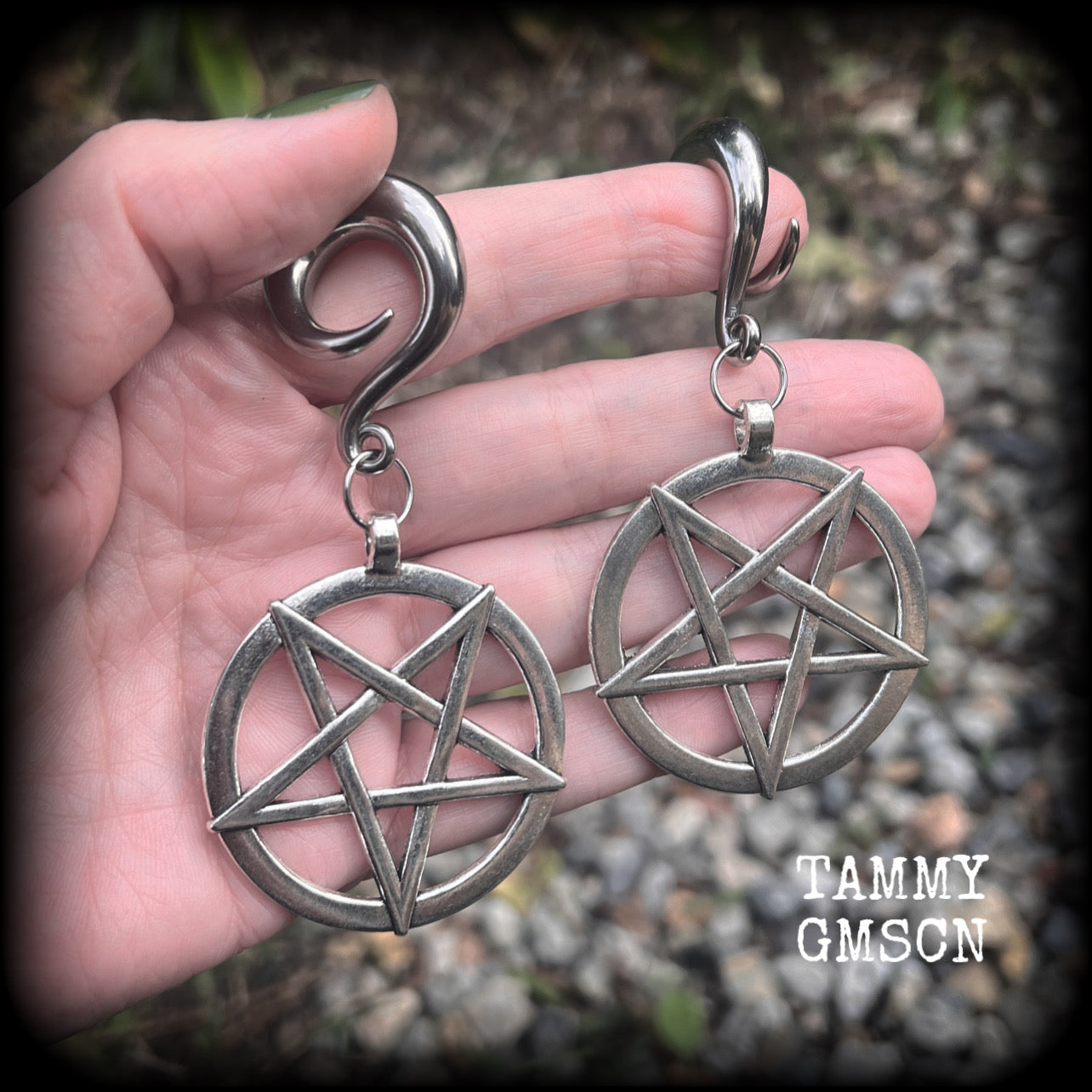These beautiful big antique silver inverted pentagram gauged earrings measure just on 9cms from tip to tip, and weigh approx 25 grams each.

This pair have been made on 0 gauge (8mm) surgical steel full curl hooks, suitable for stretched lobes.