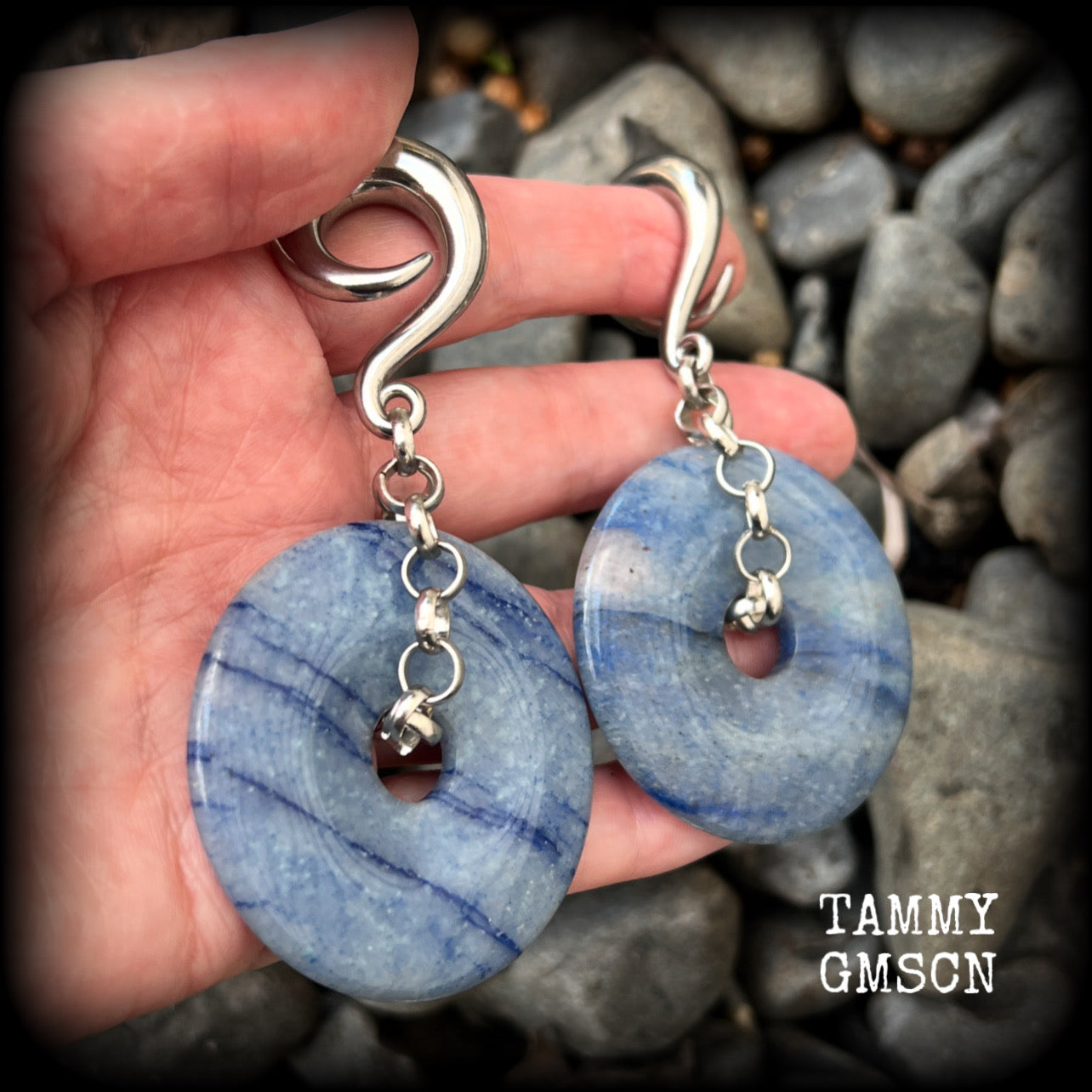 Featuring a pair of unique dusty blue aventurine donut gemstones cradled in chunky antique silver chain, this pair of gauged earrings weighs approx 44 grams a piece and measure just over 9cms from tip to tip.

These have been made on 0 gauge (8mm) surgical steel full curls, to be worn in stretched lobes.