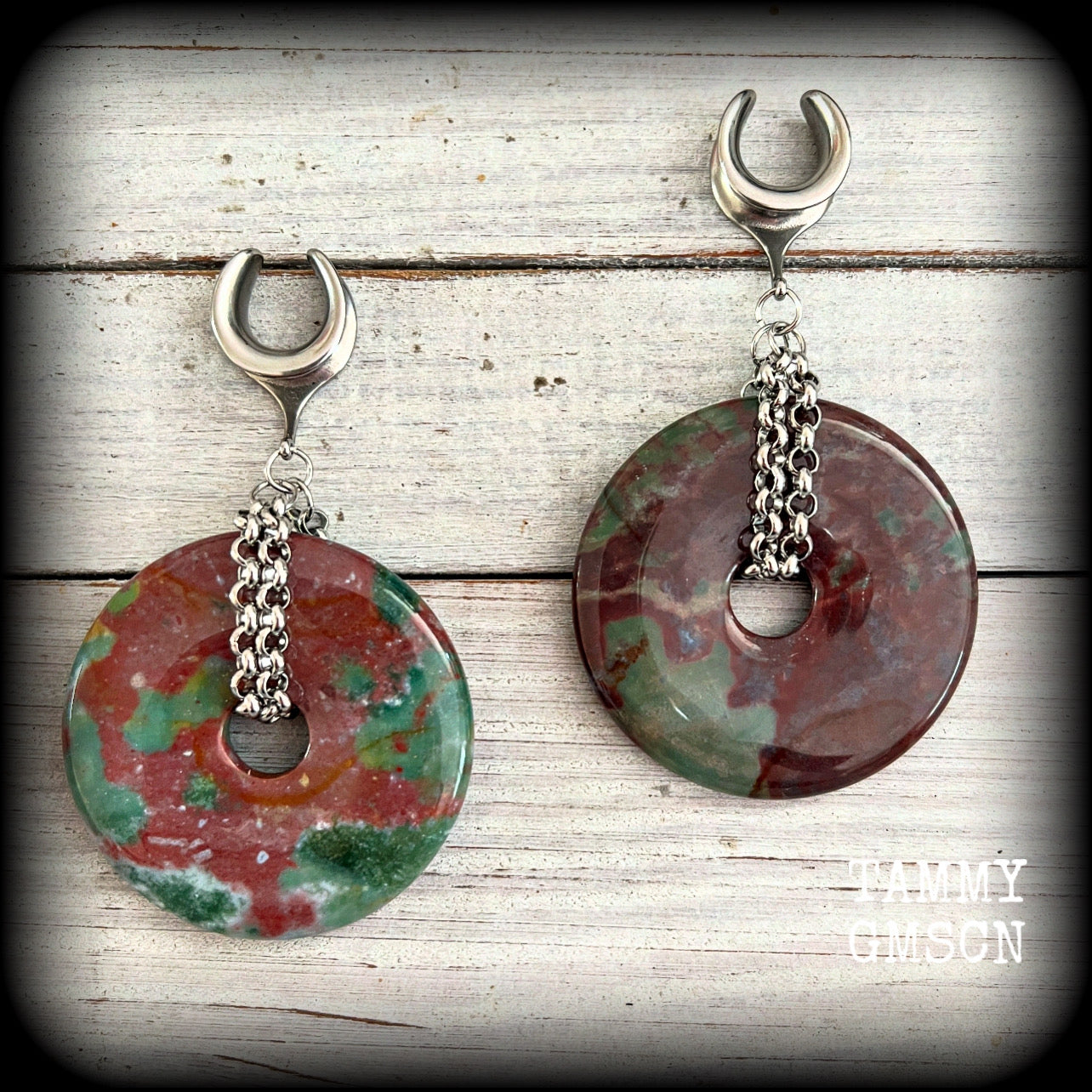 Featuring a pair of unique Indian agate donut stones cradled in stainless steel chain, this pair of gauged earrings weighs approx 30 grams a piece and measure just under 9cms from tip to tip.

These have been made on 9/14" (14mm) gauge surgical steel cradles, to be worn in stretched lobes.