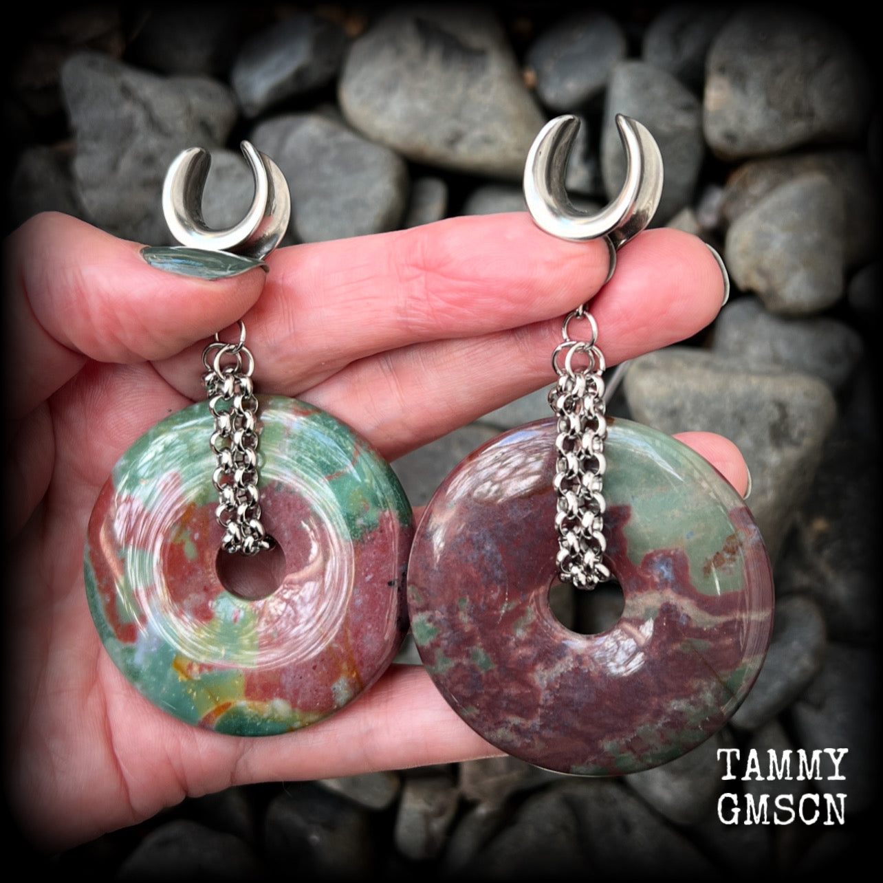 Featuring a pair of unique Indian agate donut stones cradled in stainless steel chain, this pair of gauged earrings weighs approx 30 grams a piece and measure just under 9cms from tip to tip.

These have been made on 9/14" (14mm) gauge surgical steel cradles, to be worn in stretched lobes.