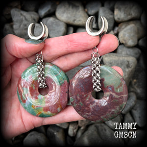 Featuring a pair of unique Indian agate donut stones cradled in stainless steel chain, this pair of gauged earrings weighs approx 30 grams a piece and measure just under 9cms from tip to tip.

These have been made on 9/14" (14mm) gauge surgical steel cradles, to be worn in stretched lobes.