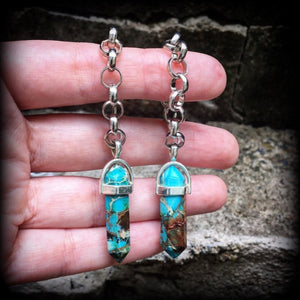These earrings feature gorgeous turquoise sea sediment jasper pendulums, measuring just on 8cms from tip to tip, and are nice and light weight, weighing only 8 grams each.

This pair has been made with our chunky antique silver chain/lobster clasp 10mm option, suitable to be worn in stretched lobes with silicone earlets from 00 gauge (10mm).