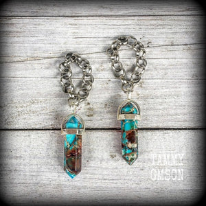 These earrings feature gorgeous turquoise sea sediment jasper pendulums, measuring just on 8cms from tip to tip, and are nice and light weight, weighing only 8 grams each.

This pair has been made with our chunky antique silver chain/lobster clasp 10mm option, suitable to be worn in stretched lobes with silicone earlets from 00 gauge (10mm).