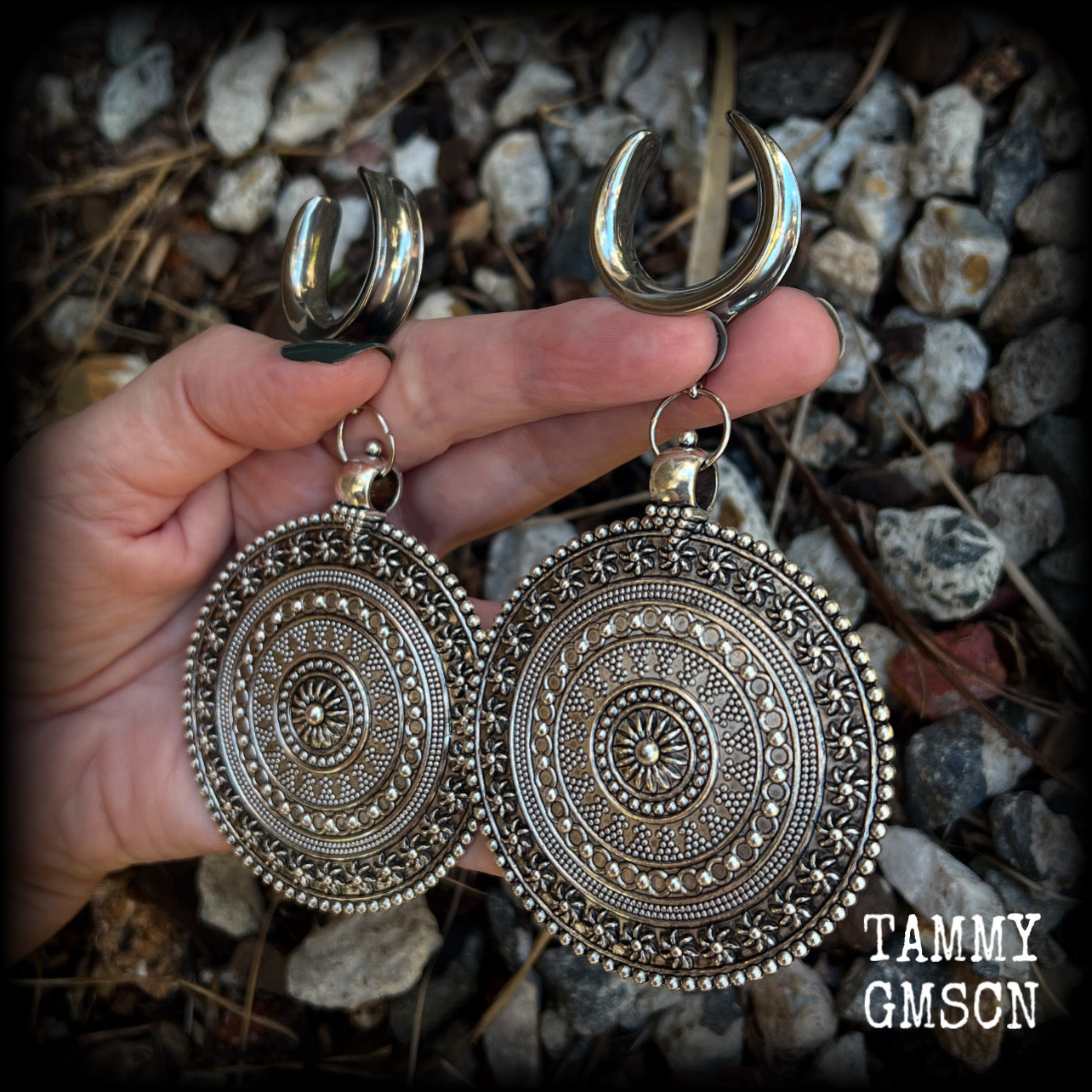 These big beautiful antique silver mandala gauged earrings are gorgeous!! Weighing in at approx 33grams a piece, measuring just on 12cms from tip to tip, this pair of gauged earrings are lovely and dangly but not too heavy.

This pair have been made on 1” gauge (25mm) surgical steel cradles, suitable for stretched lobes.
