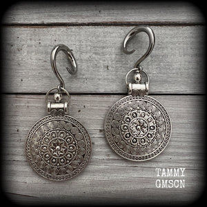 These gorgeous antique silver mandala gauged earrings are nice and light weight, weighing approx 11 grams a piece, measuring approx 7.5cms from tip to tip.

This pair have been made on 6 gauge (4mm) surgical steel full curl hooks, suitable for stretched lobes.