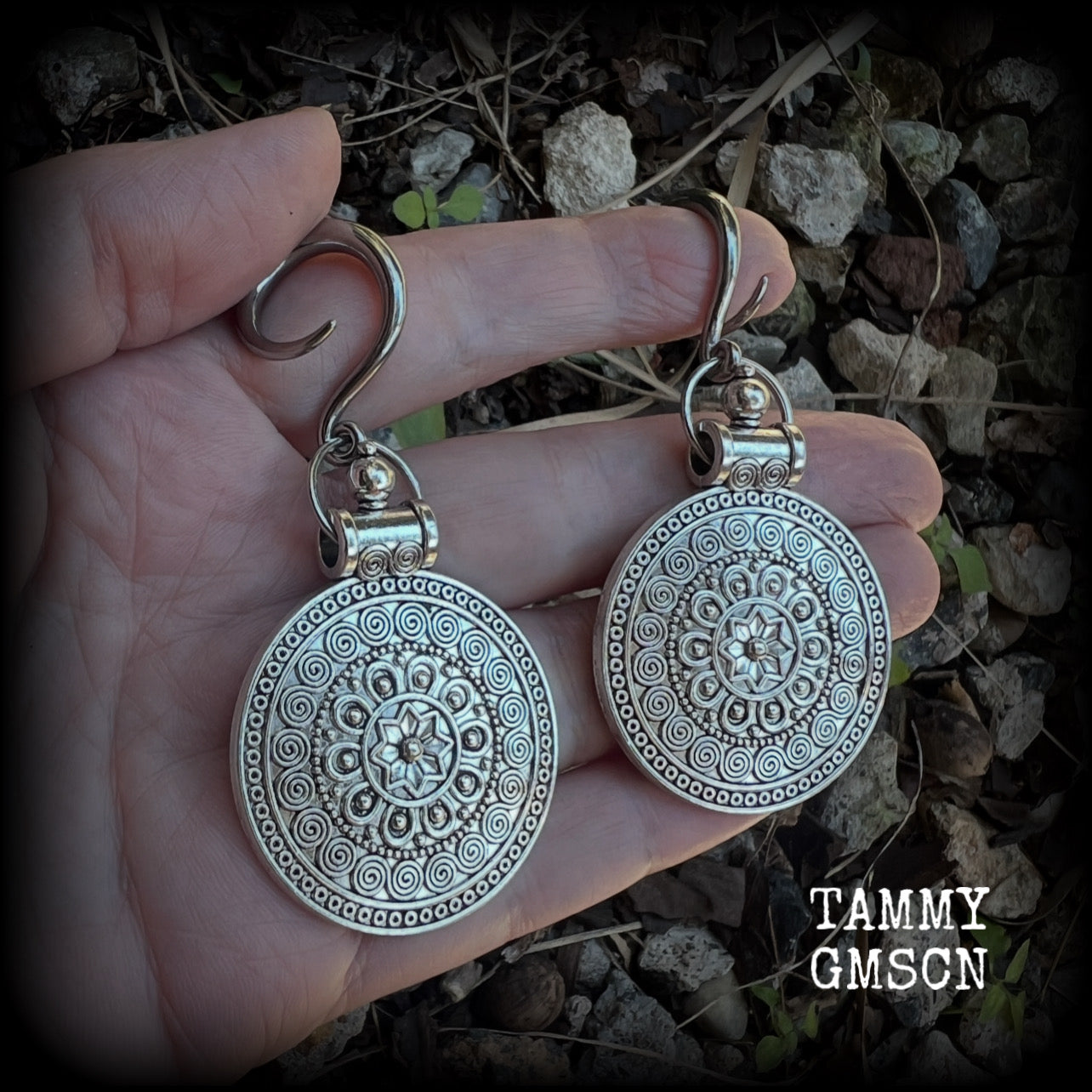 These gorgeous antique silver mandala gauged earrings are nice and light weight, weighing approx 11 grams a piece, measuring approx 7.5cms from tip to tip.

This pair have been made on 6 gauge (4mm) surgical steel full curl hooks, suitable for stretched lobes.